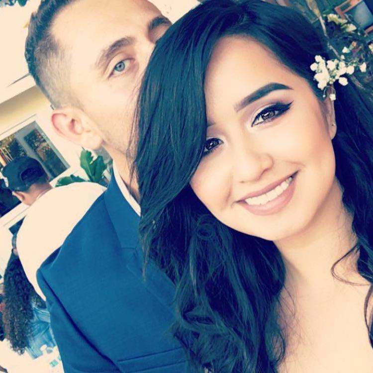 At my cousin's wedding secretly wishing it was ours..