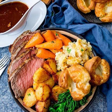Get us a traditional Sunday Roast Dinner in London!