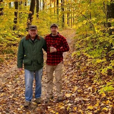 Brendan and His dad camping.