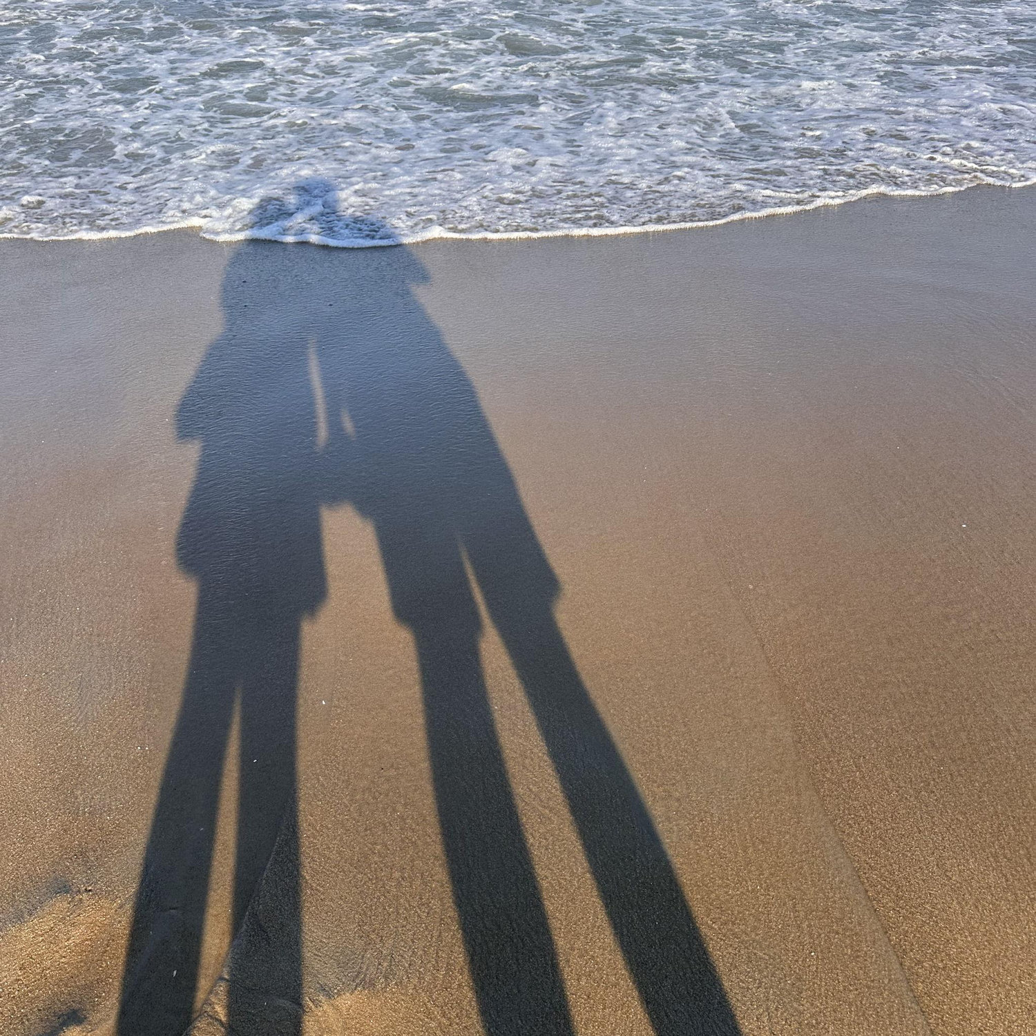 Taken on the beach in Ocean City, Maryland on our engagement trip!