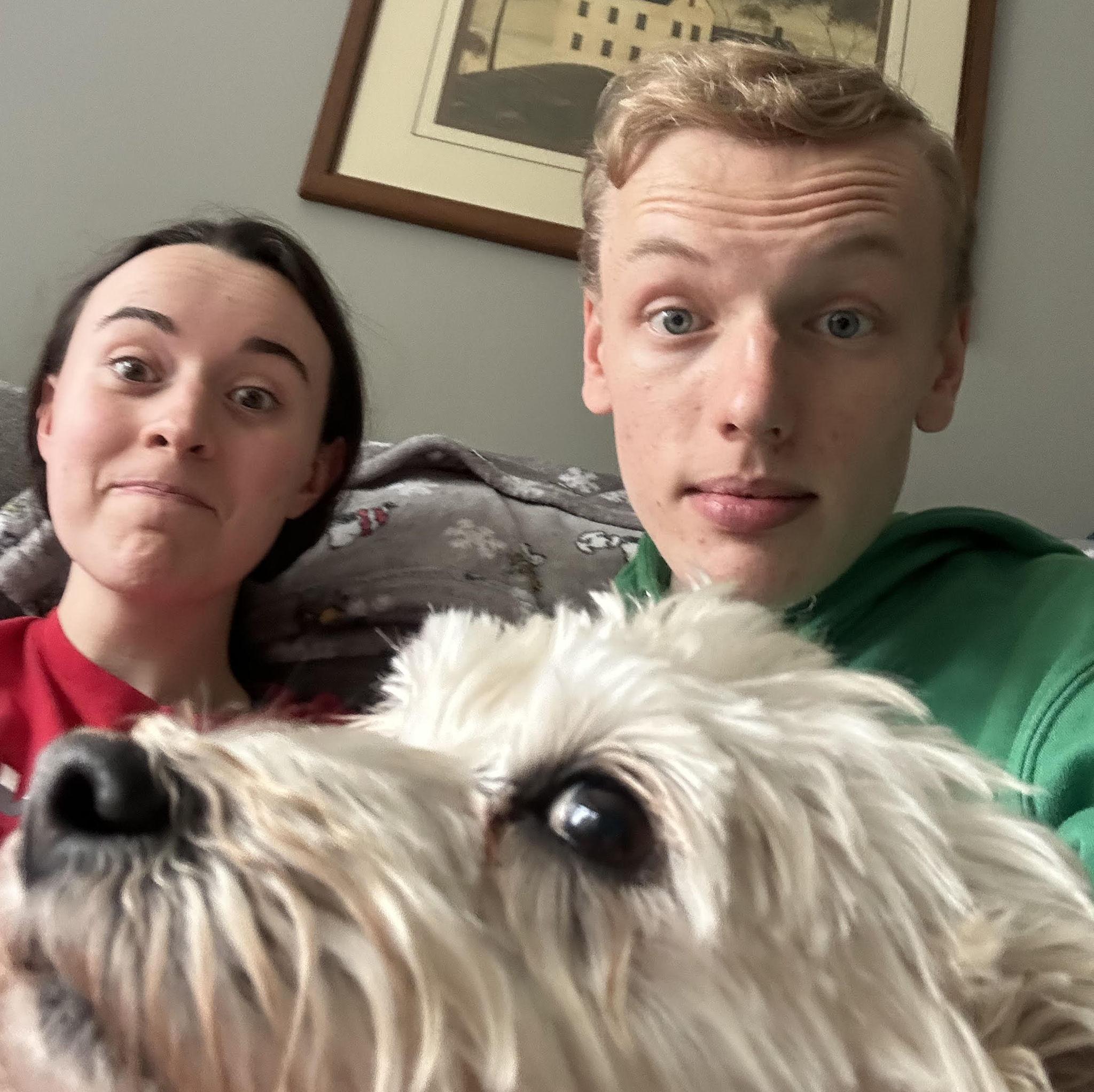Ben and Megan share a love of sitting on couches with dogs.