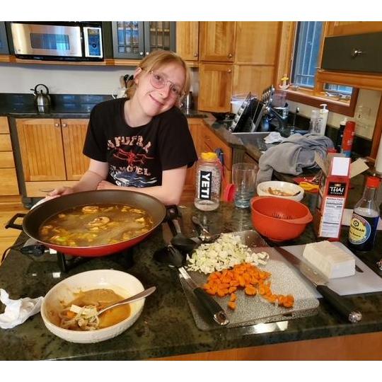 Homemade Hot Pot! Two new Pandemic developments on display: Olivia cut her own bangs and discovered the joy in cooking - summer 2020