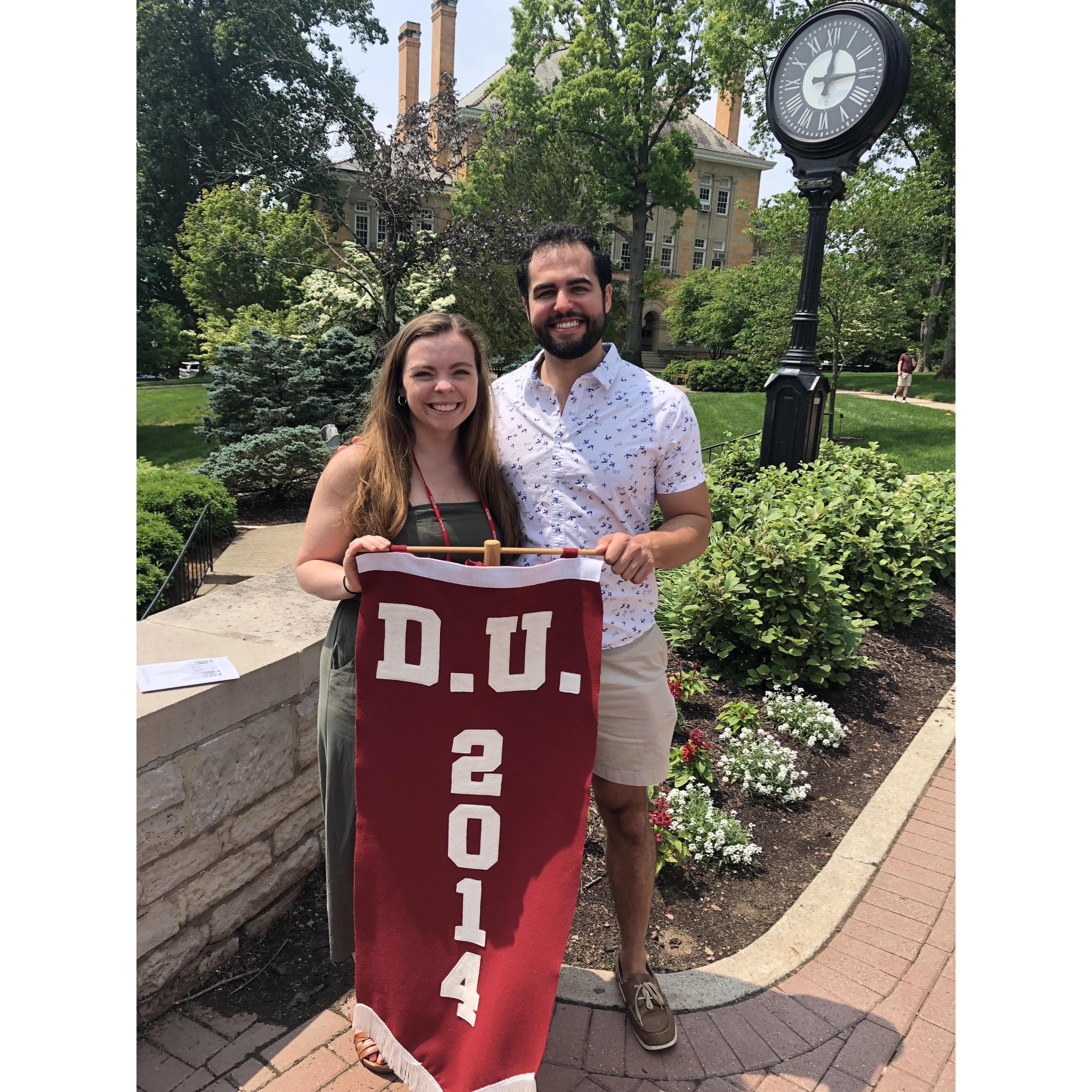 Chris and Krissy holding the class pennant at Denison University's five year reunion