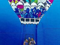 Air balloon mural with a real basket