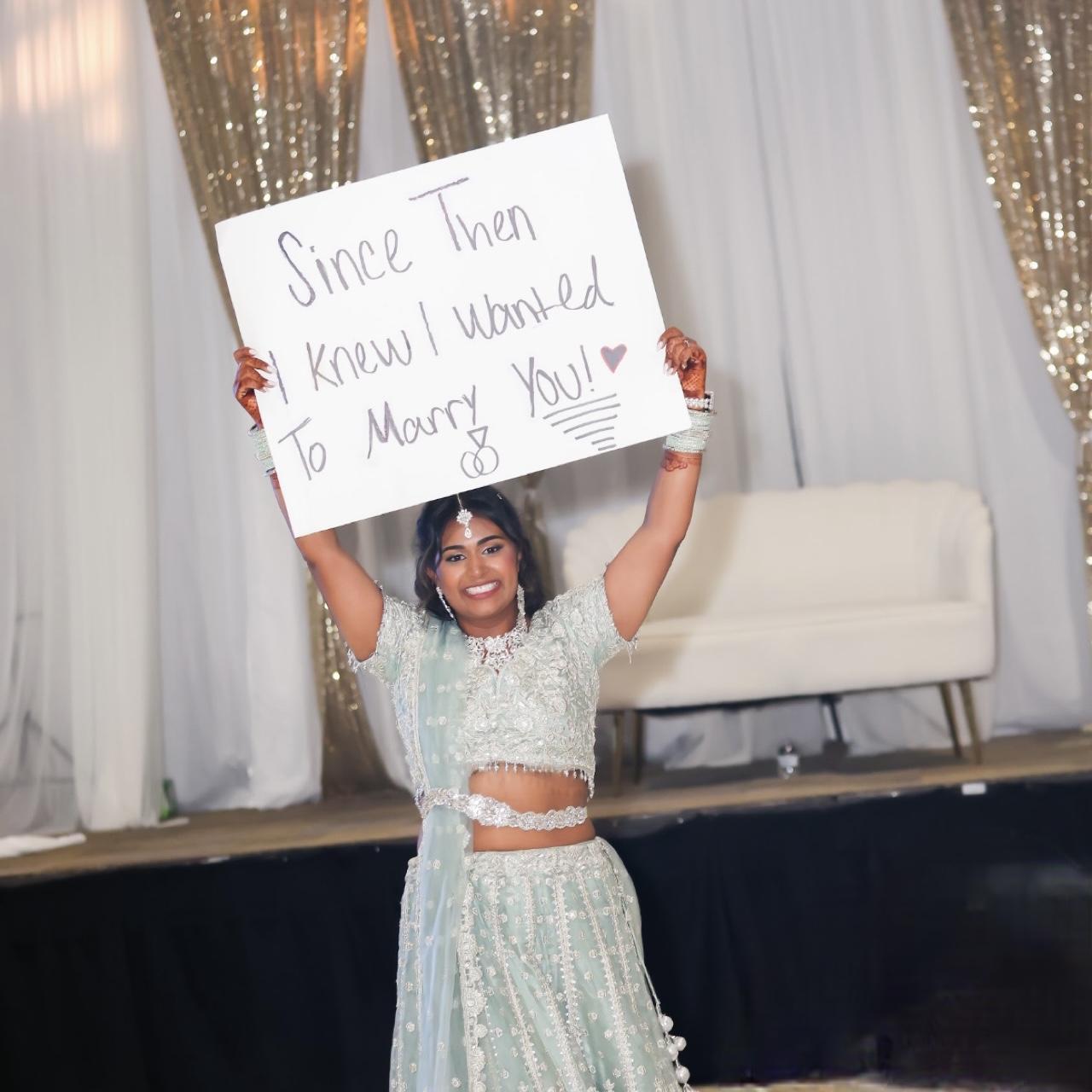 If you were at our engagement party, you saw this performance. This sign was in reference to our first date in July!