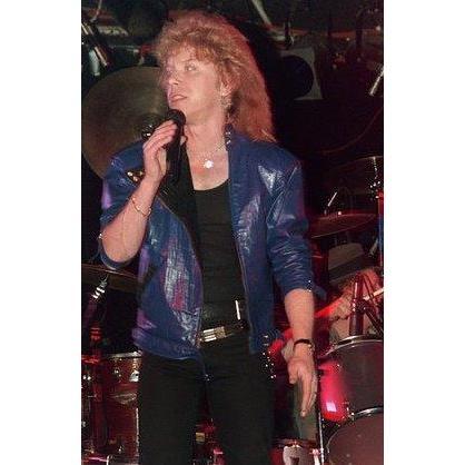 Greg looking like David Bowie with the long rock star hair and blue leather jacket- Twiggy Barbust, 1989.