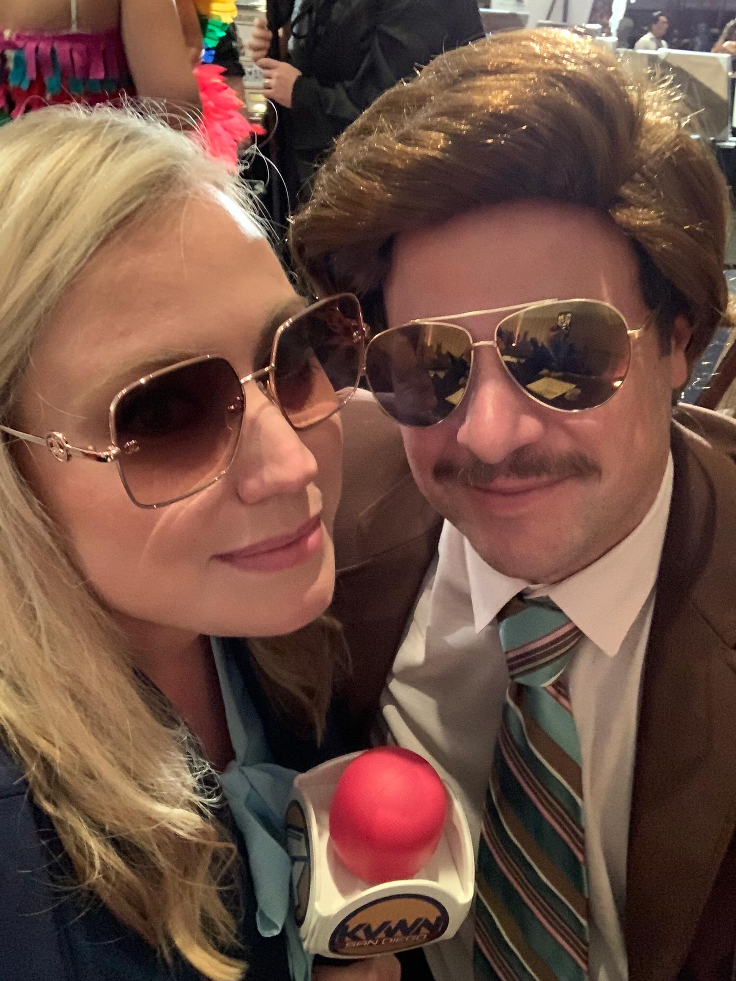 “I’m kind of a big deal” - Kevin killing it in his vintage Sears suit and wig as Ron Burgundy.
Posing who “Veronica” his co-anchor. 😍