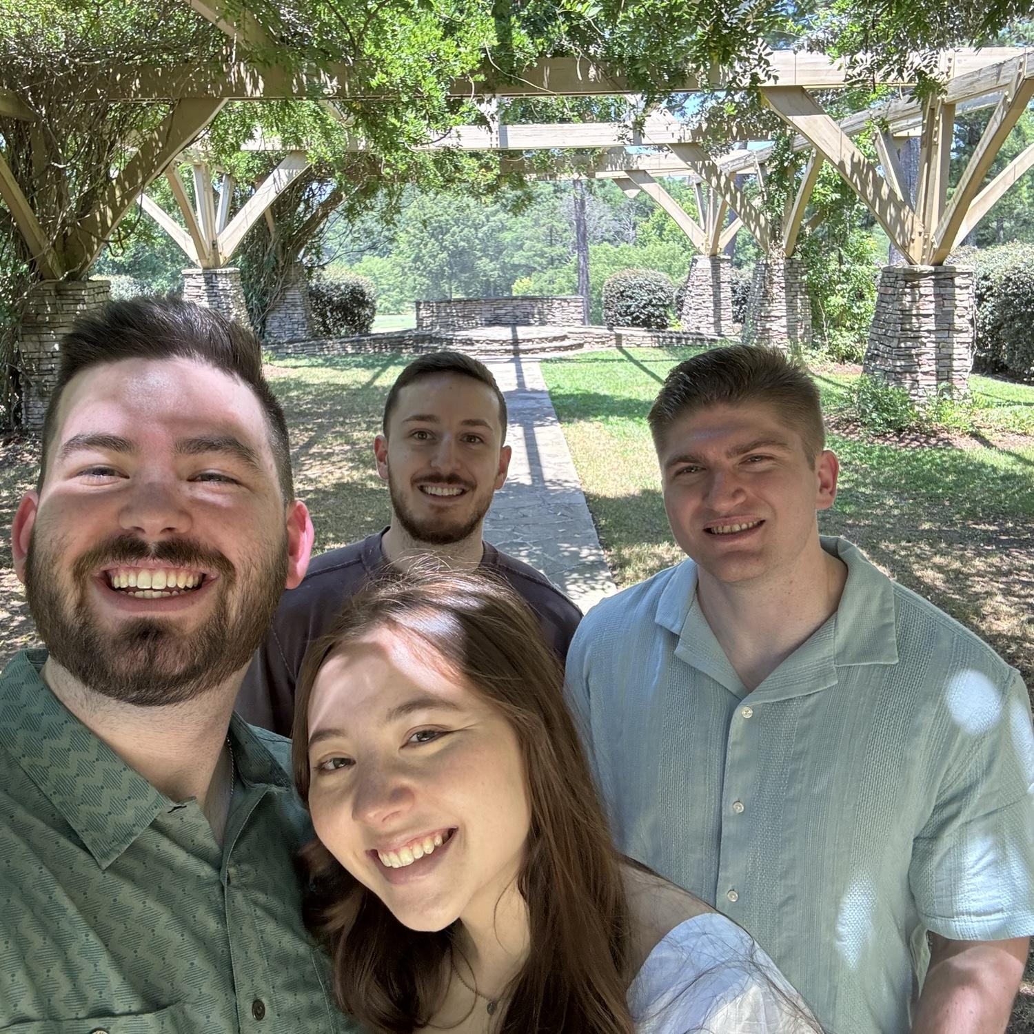 June 2024: Brittany, Kyle, and “the boys” (Zach on left, Jason on right)  visiting the venue all together for the first time, one year before the wedding!