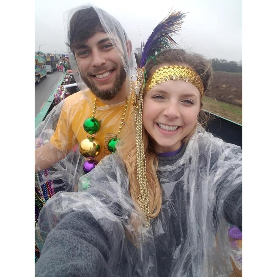 Our first Mardi Gras float! Rain or shine it's party time!