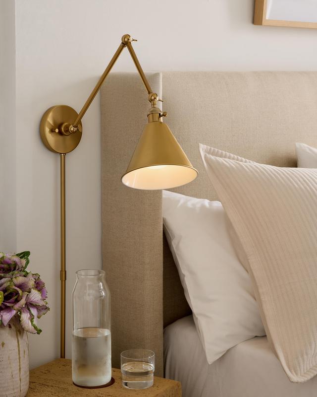 Articulating Double Arm Steel Wall Sconce in Brass