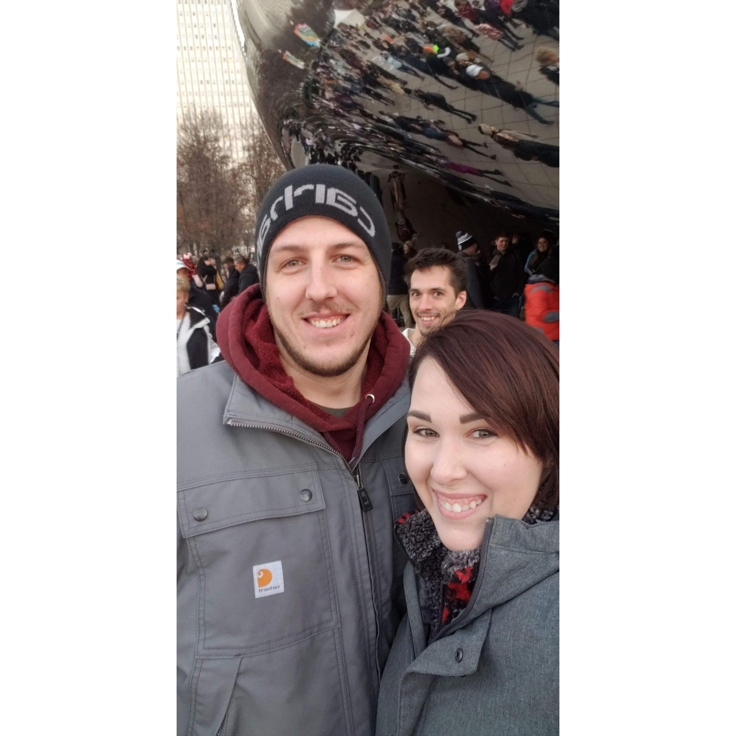 Stephanie's sibling Christmas in Chicago. That's her brother photobombing in the back.