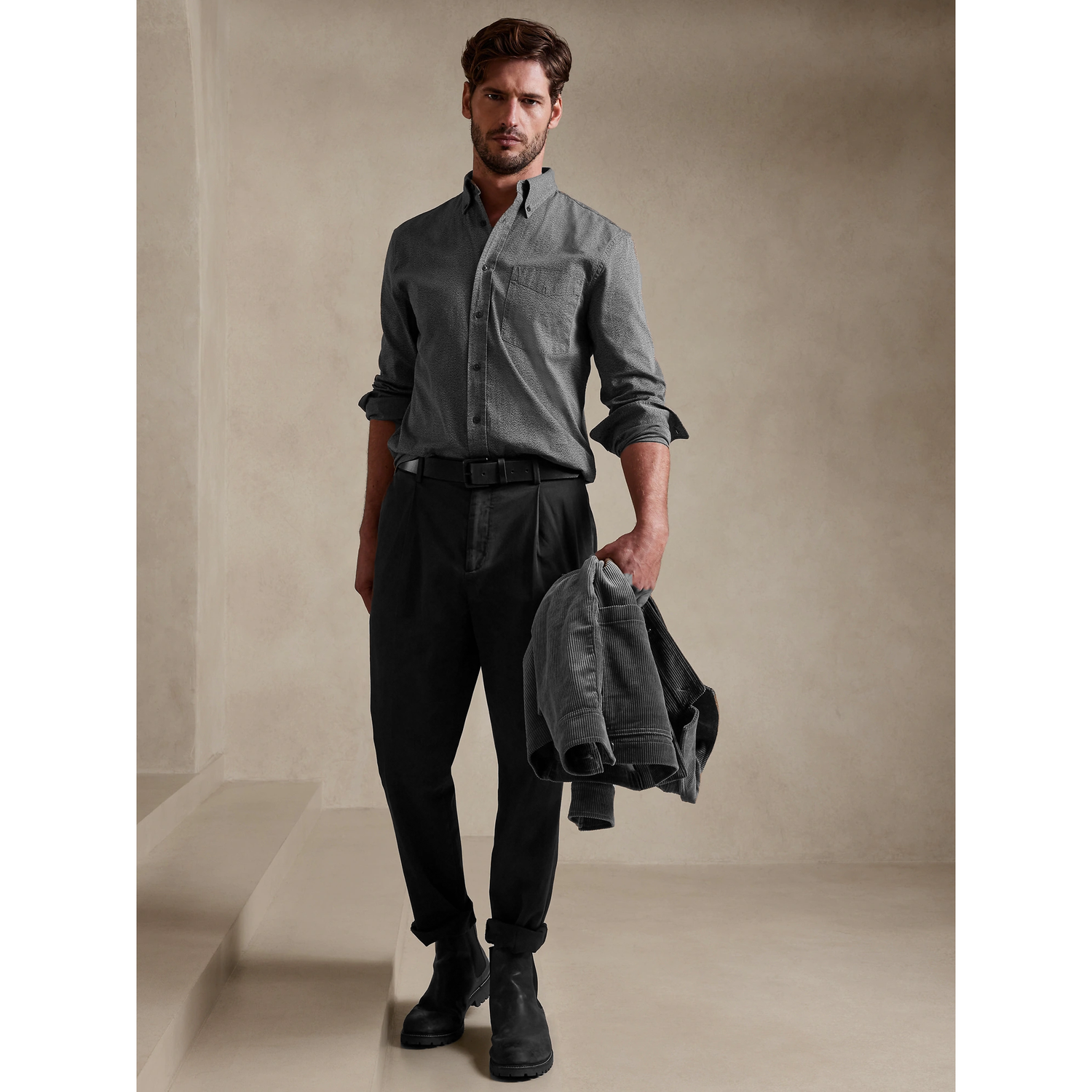 A grey linen button down with dark trousers is a safe option for the straight people coming.