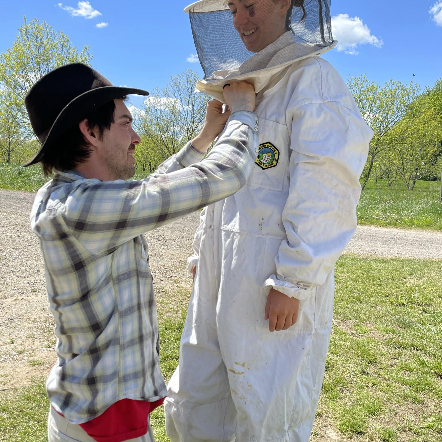 Morgan learning to tend to (and falling in love with) honeybees!