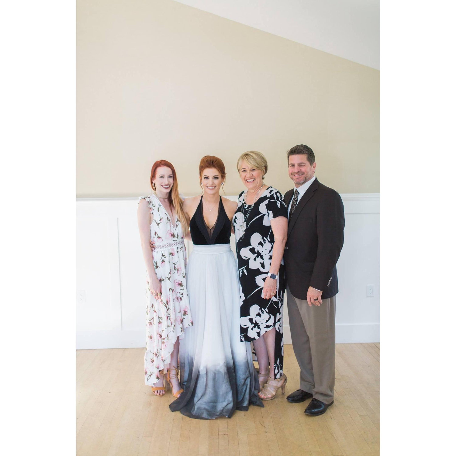 Holly Boucher Skinner with husband Mark and daughters Caroline and Emily.