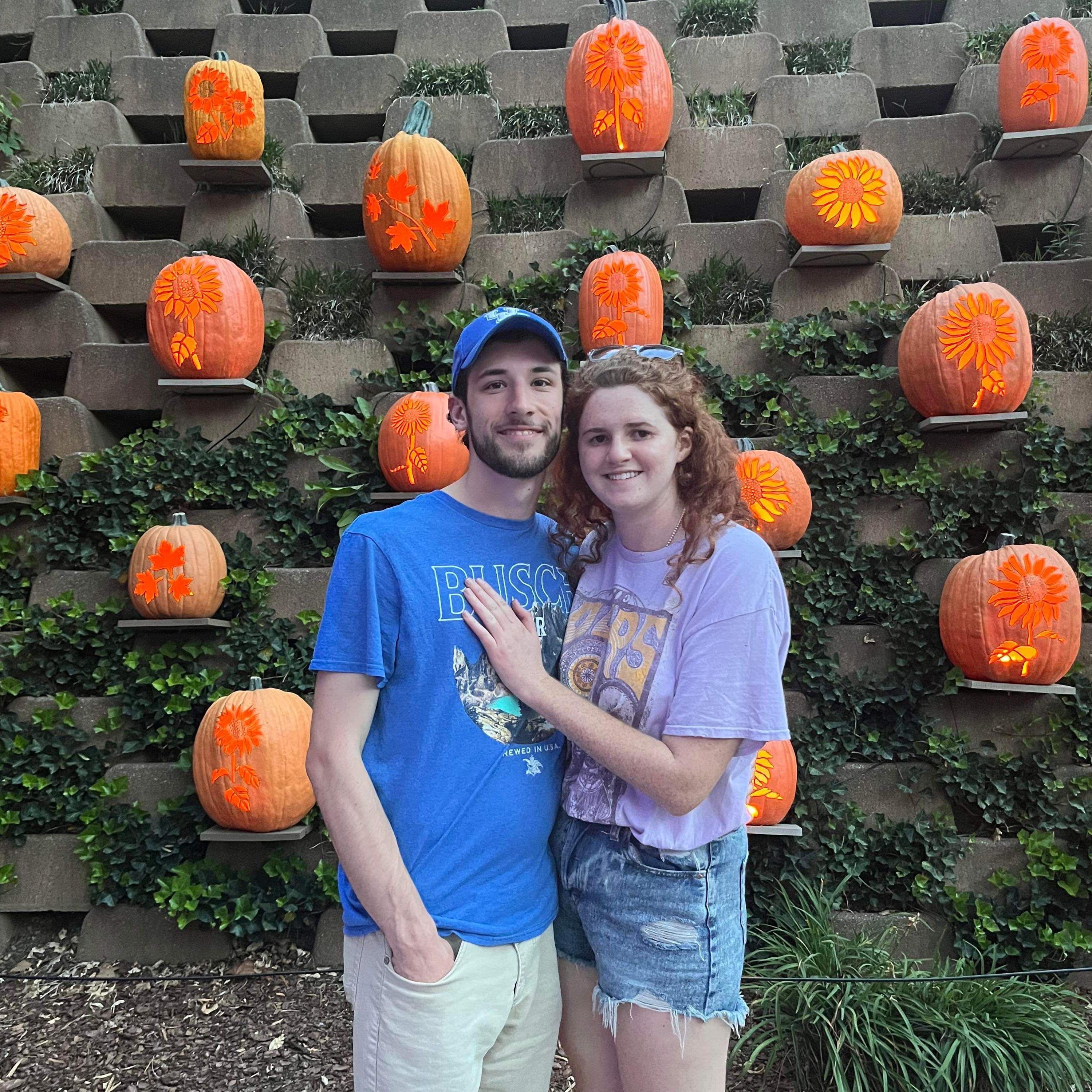 Both of our birthdays are in October, so Halloween time is special! We took this on vacation at Dollywood, shortly before security intervened to prevent Lauren from stealing one of those pumpkins.