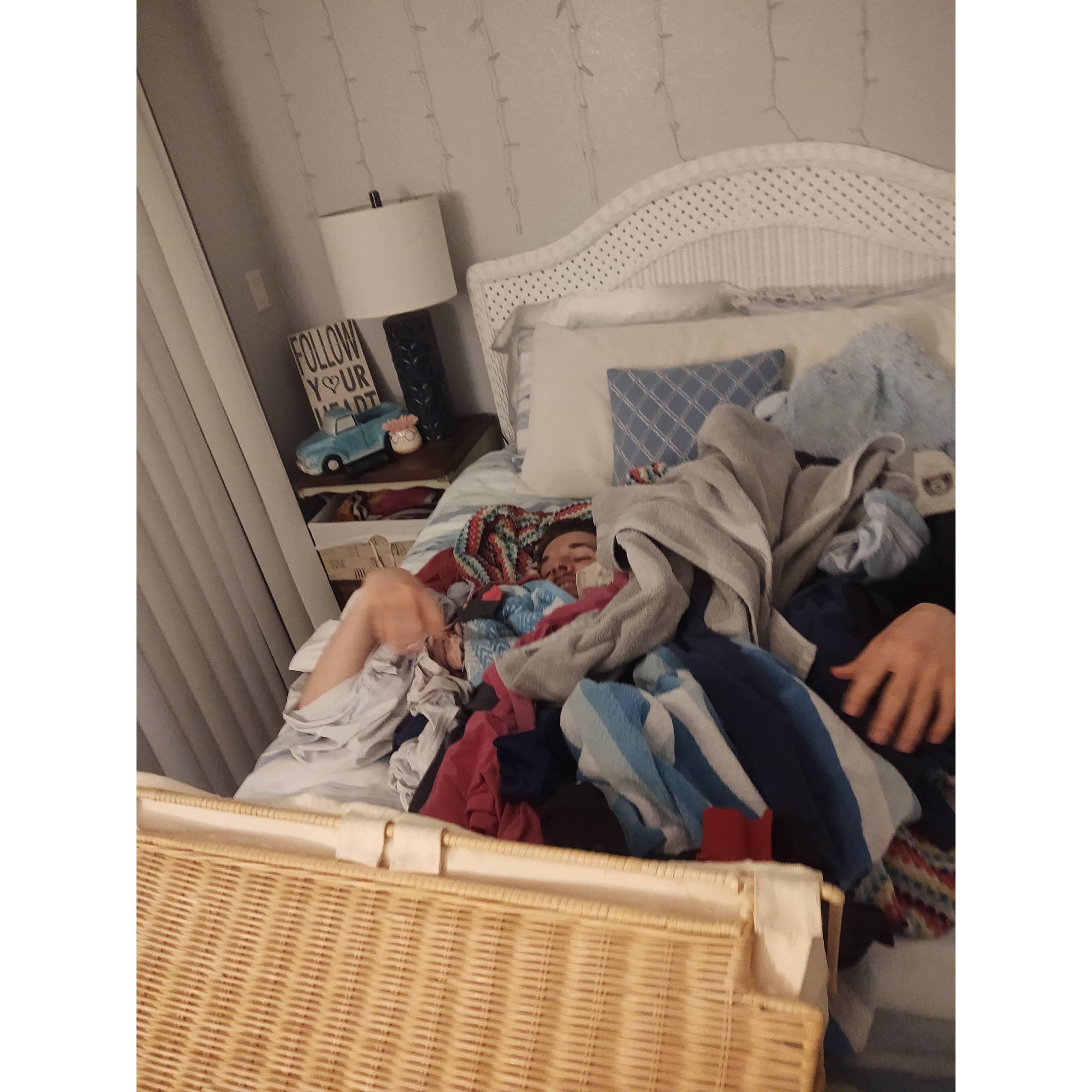 If you get buried in the laundry, you can't see it. If you can't see it, it isn't there. If it isn't there, you don't have to do laundry! WOOOOOOOO!