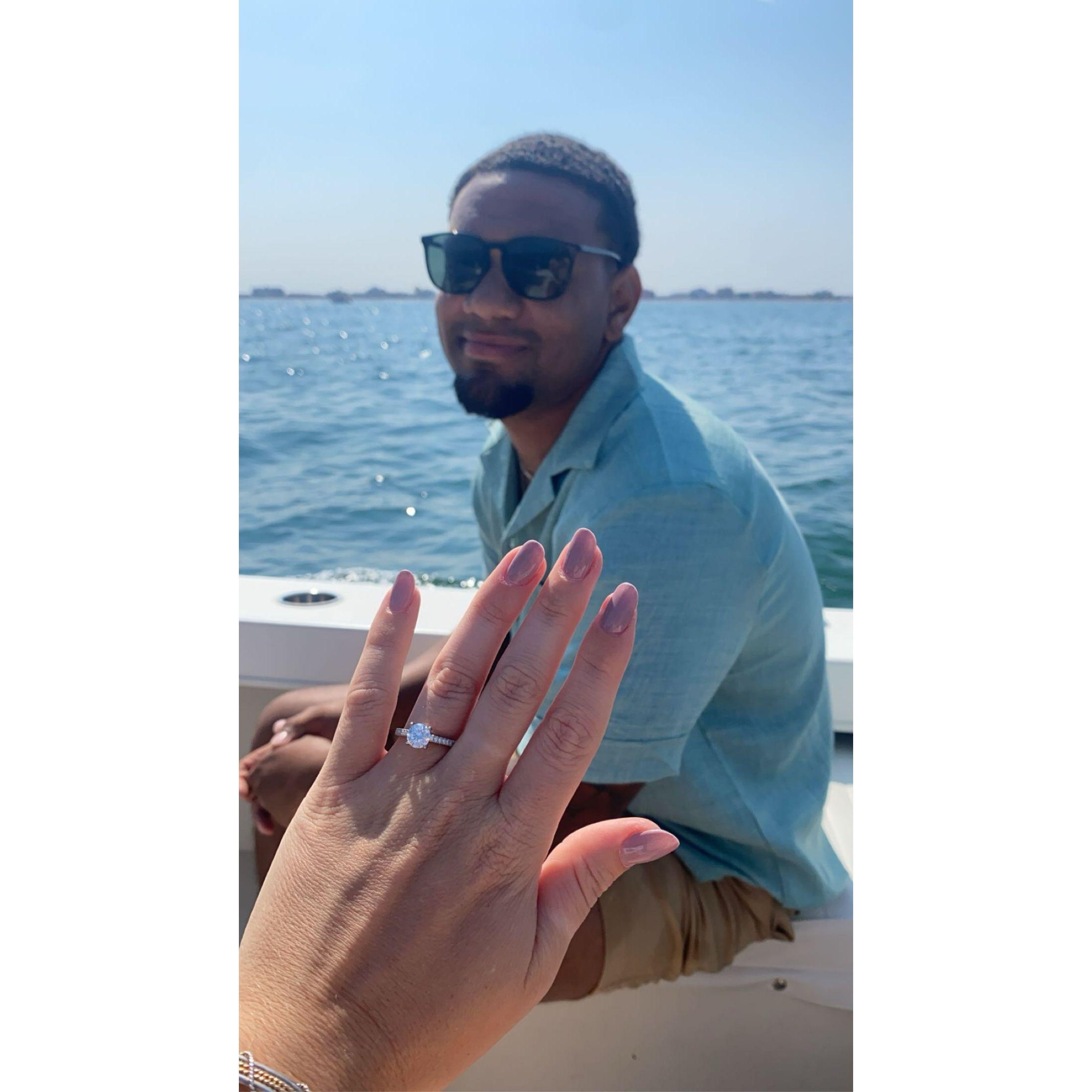 The day we got engaged! On a boat with family and friends watching the planes