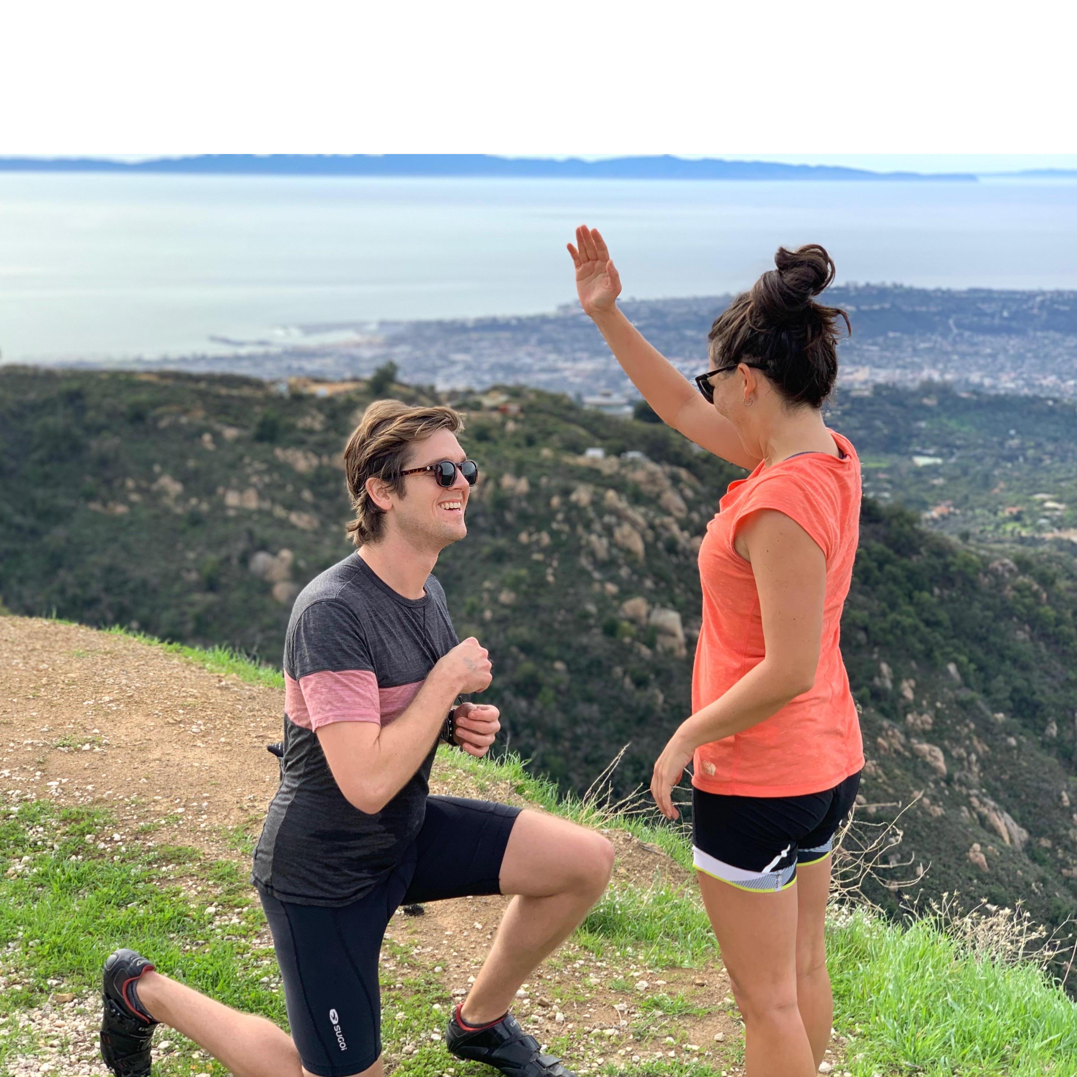The proposal! Stef's arm is still in the supply & demand pose that we were re-creating from our first photo together. January 2019.