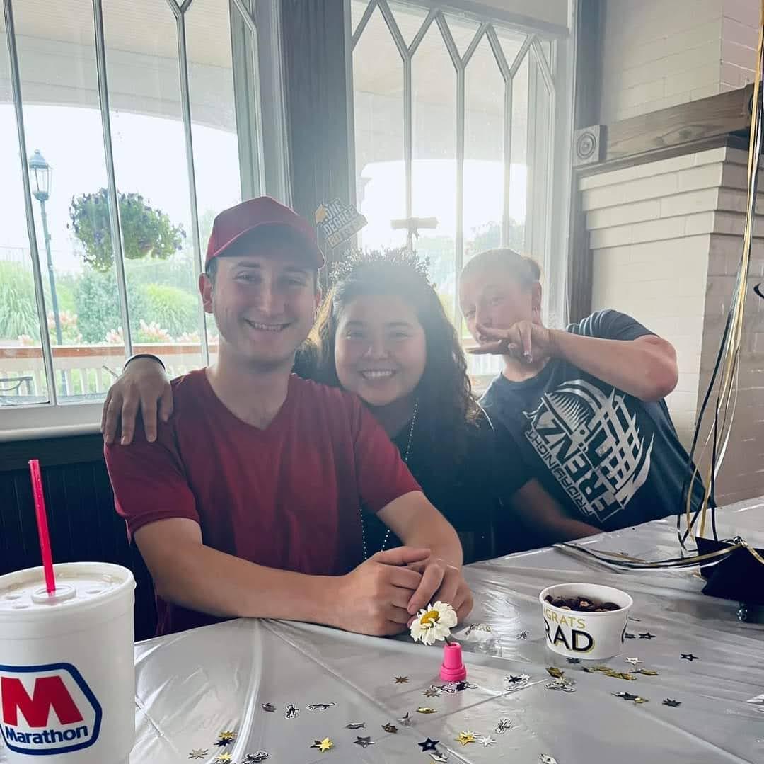 My graduation party that Zebulun attended- where you can see our coworker was already gesturing to us like we were a couple!