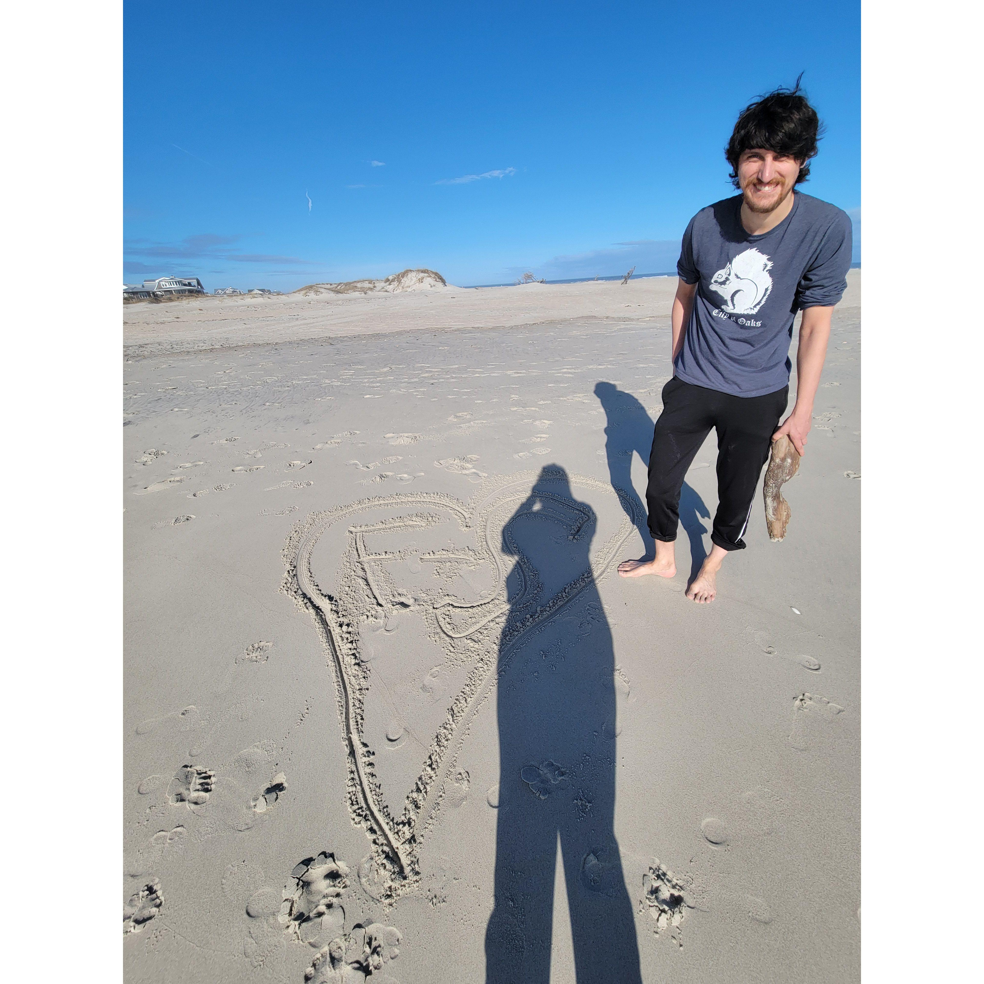 Francis is an artist and drew a heart with our initials in the sand