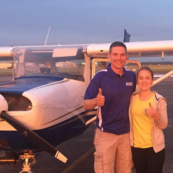This was taken right after my first solo flight as a pilot! My flight instructor was so proud!