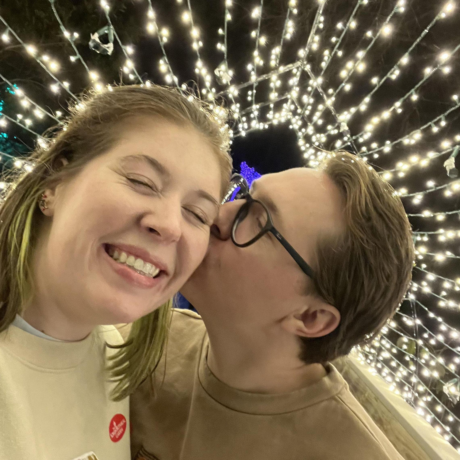 Looking at Christmas lights together