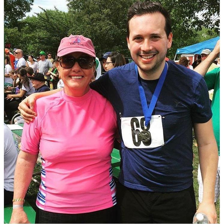 Rob winning a medal after running in a 5k for Melanoma. Team "Mela-no-more" and I still think I'm very clever for that name! Momma Piro is now officially Melanoma free :)