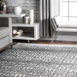 Lorette Faded Arrowhead Area Rug