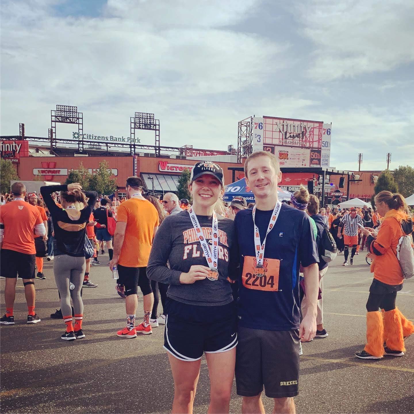 Running with Gritty -- and the only time you'll see Mallory in Flyers gear!