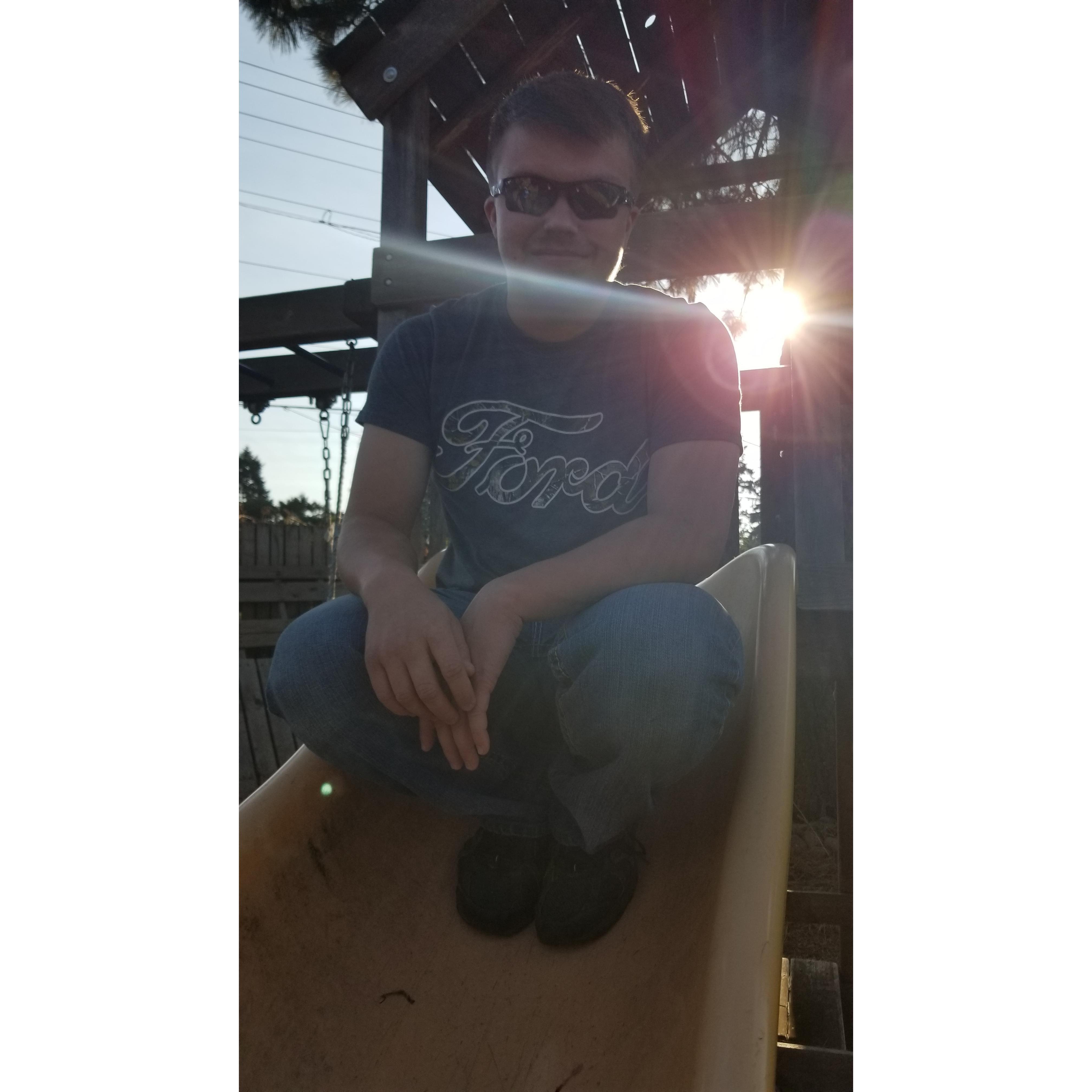 Cody on the same slide he grew up with 20+ years ago
