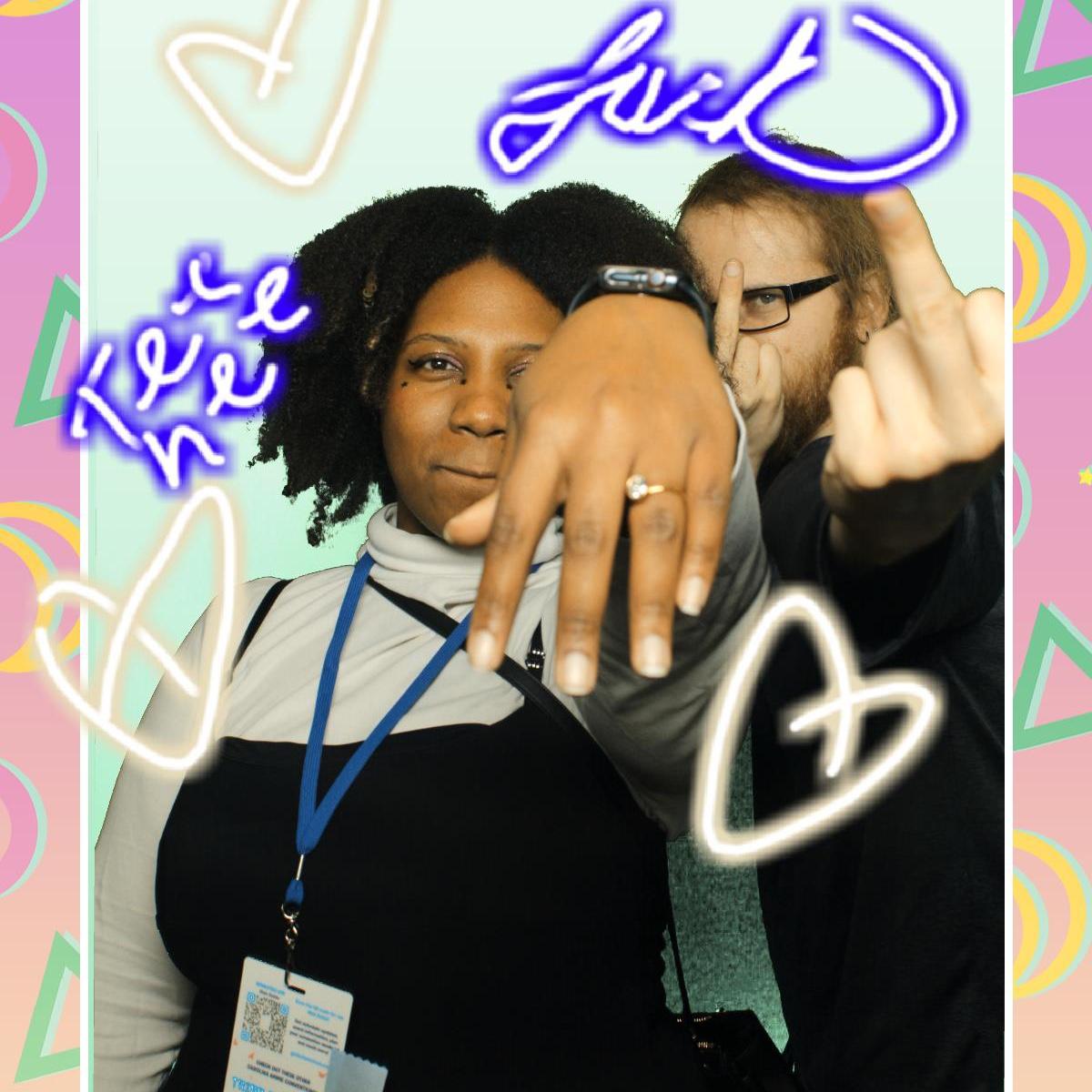 The day we got engaged at an anime convention right after we realized our hotel was gross but it ended up being fine and we went to a Photo Booth to celebrate