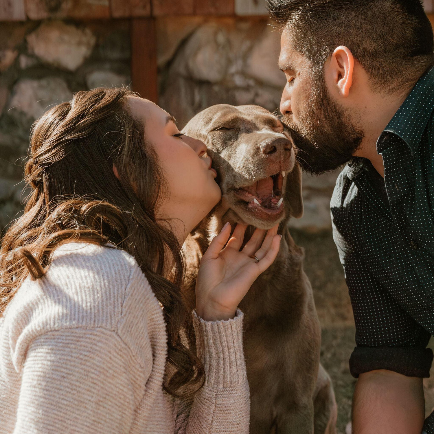 Holly getting kisses from Mom and Dad