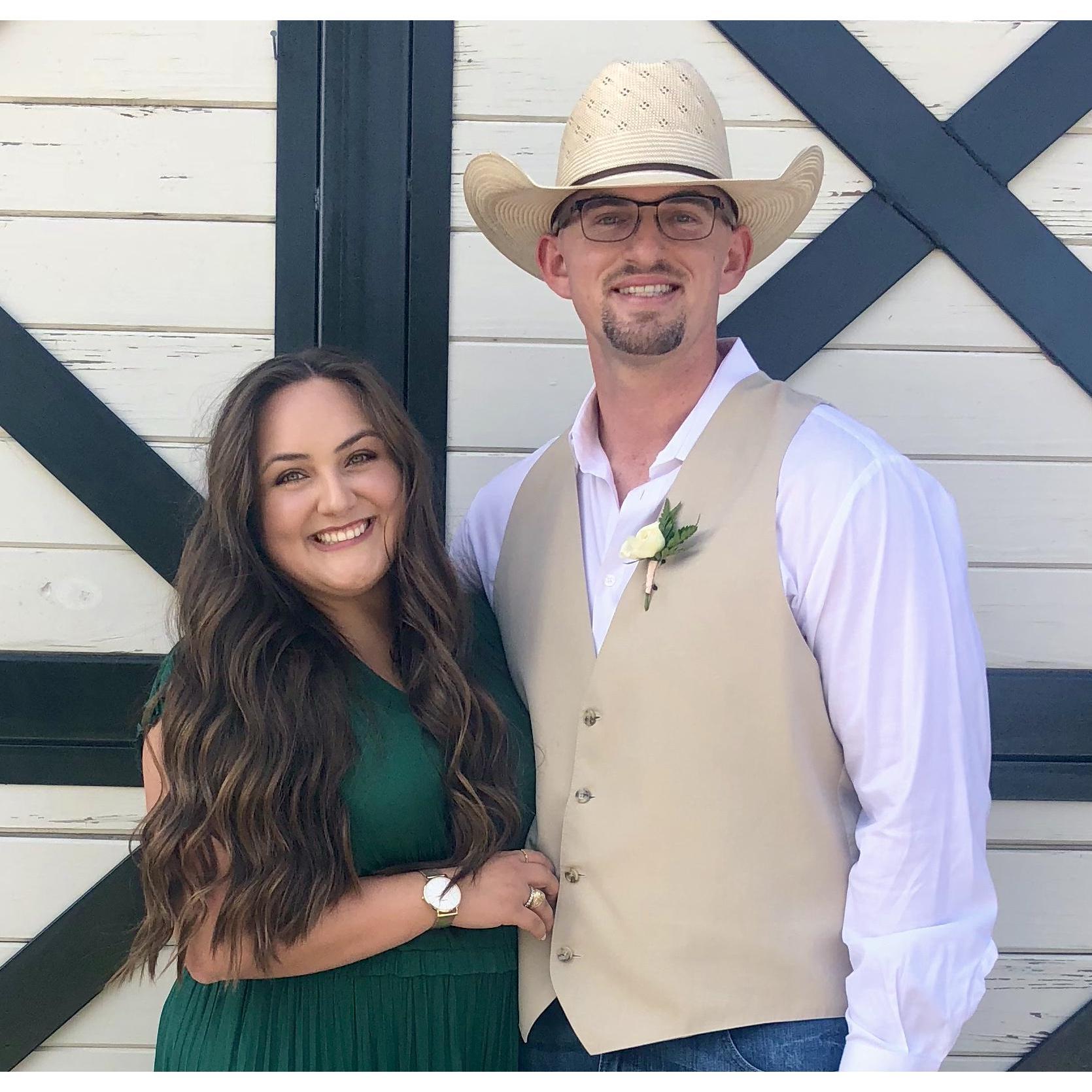 Adorable photo at a family wedding! Emily wasn't a fan of the cowboy hat lol.