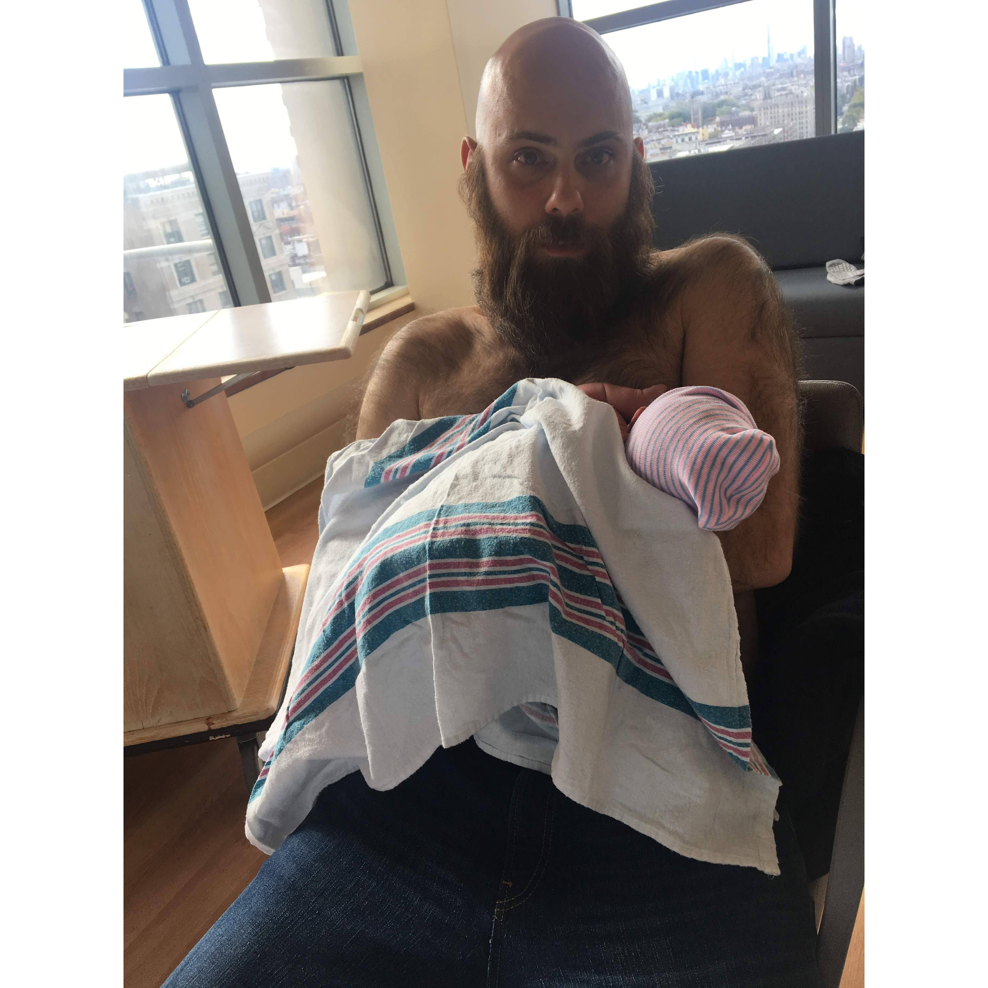 Daddy's skin to skin with Asante.