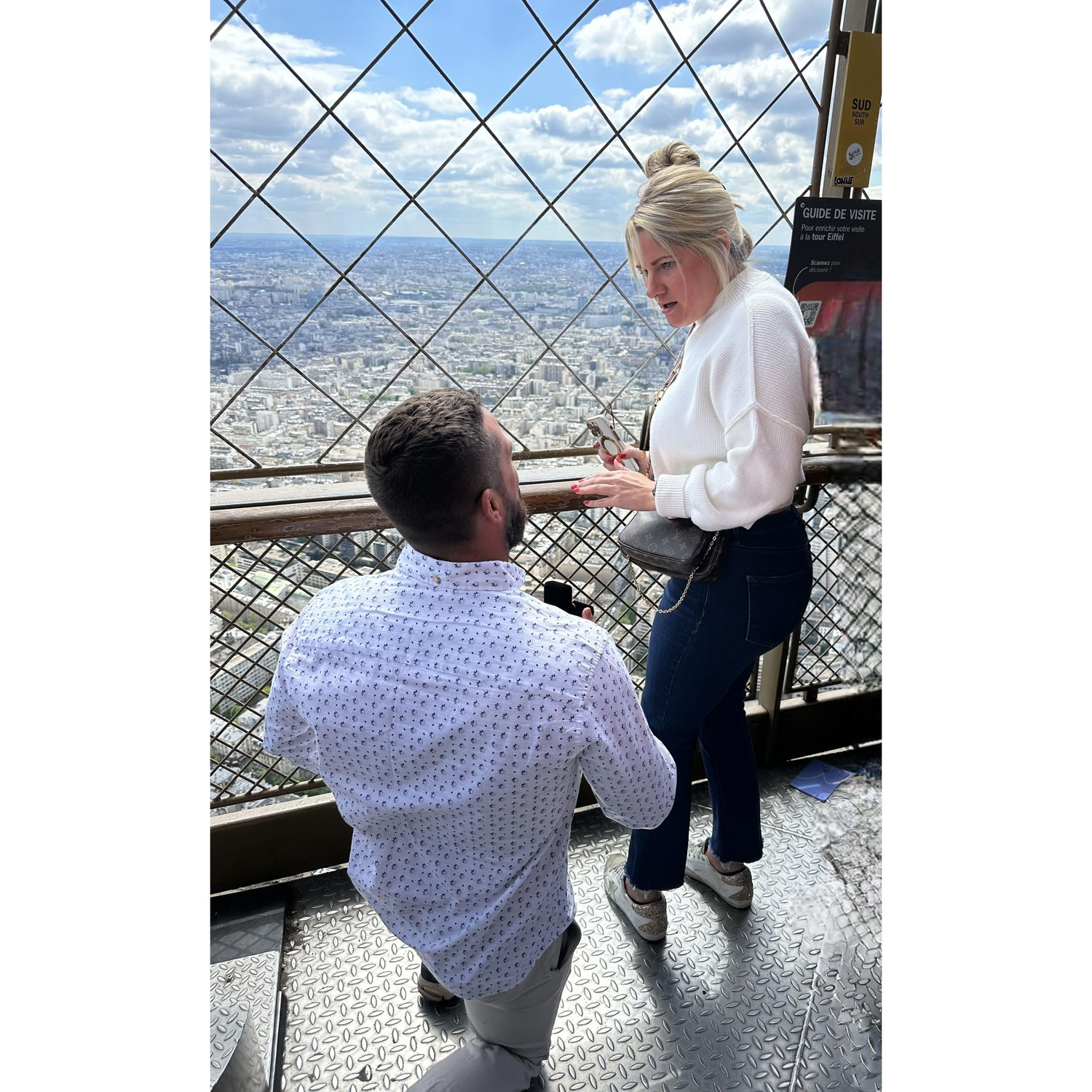 Chris stood next to me and laughed then said "wouldn't it be cool if you got engaged up here" I of course, flipped him off and called him a dick.. turned around and saw this!