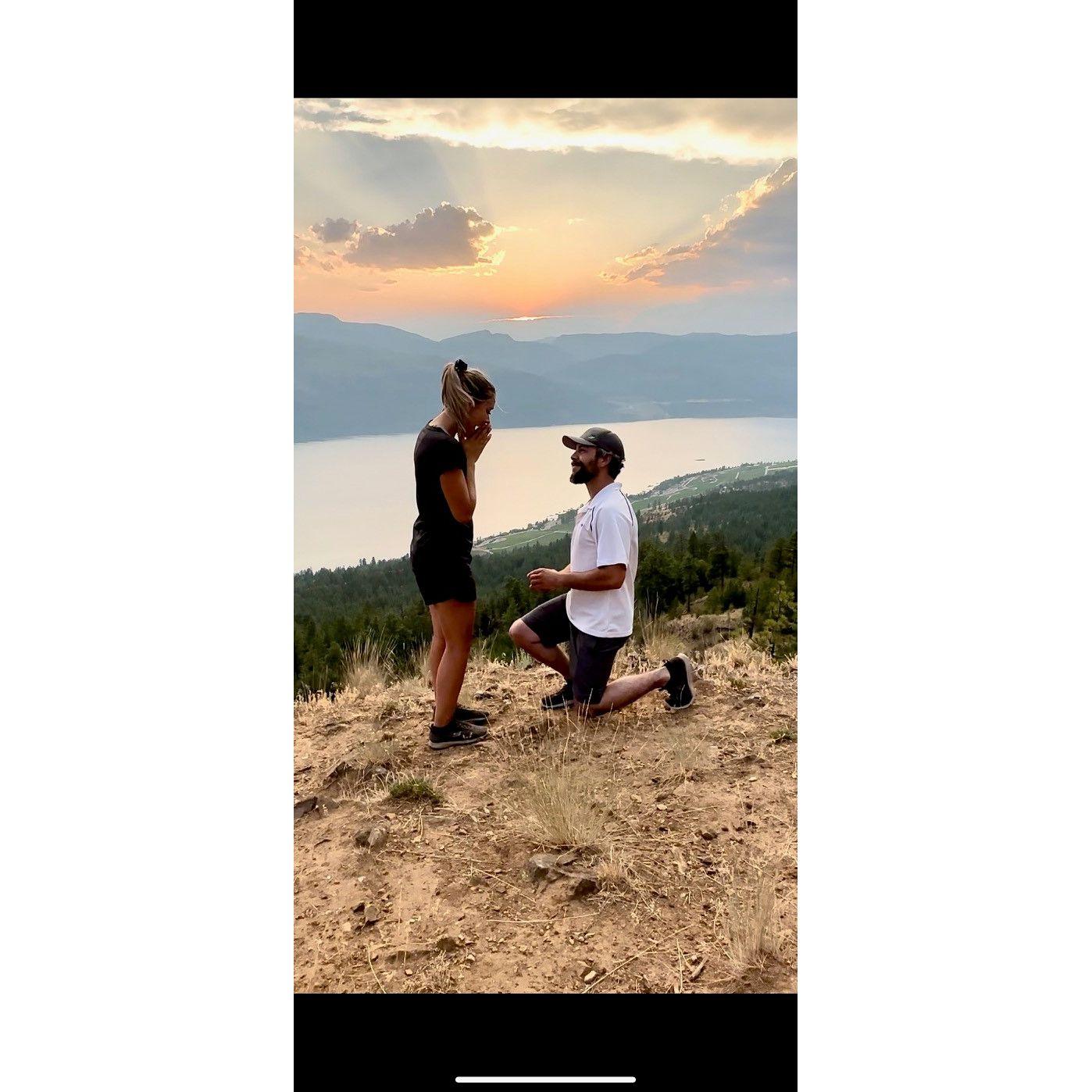 B popped the question on top of a mountain in Kelowna during the sunset. Completely surprised, Khristen barely gave him time to fully ask before she mauled him with an excited repeating "yes yes yes!"