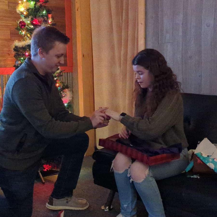 Jaden putting the ring on my finger!