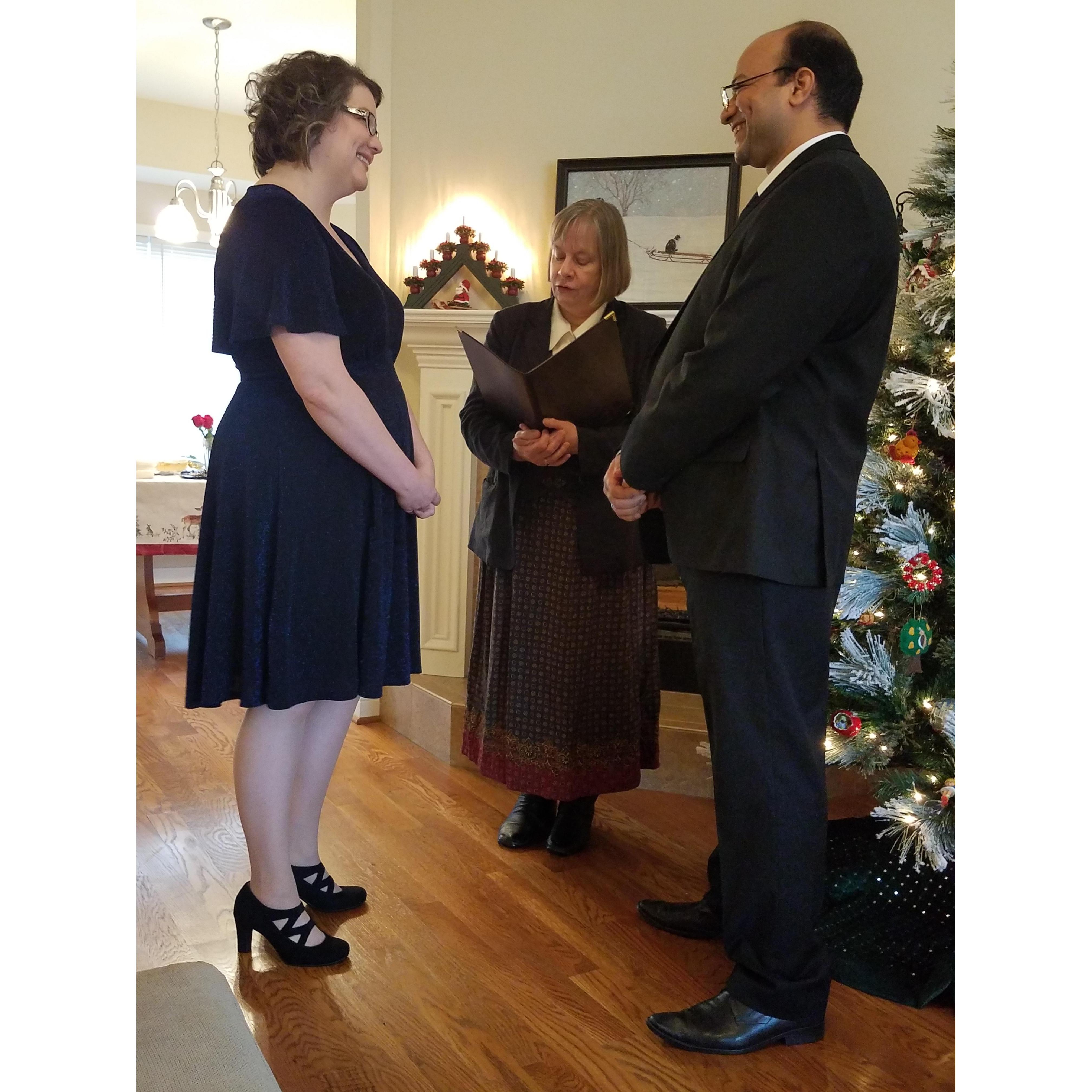 Our wedding ceremony in our living room, January 1, 2019, with Reverend Jeanmarie Rouhier-Willoughby.