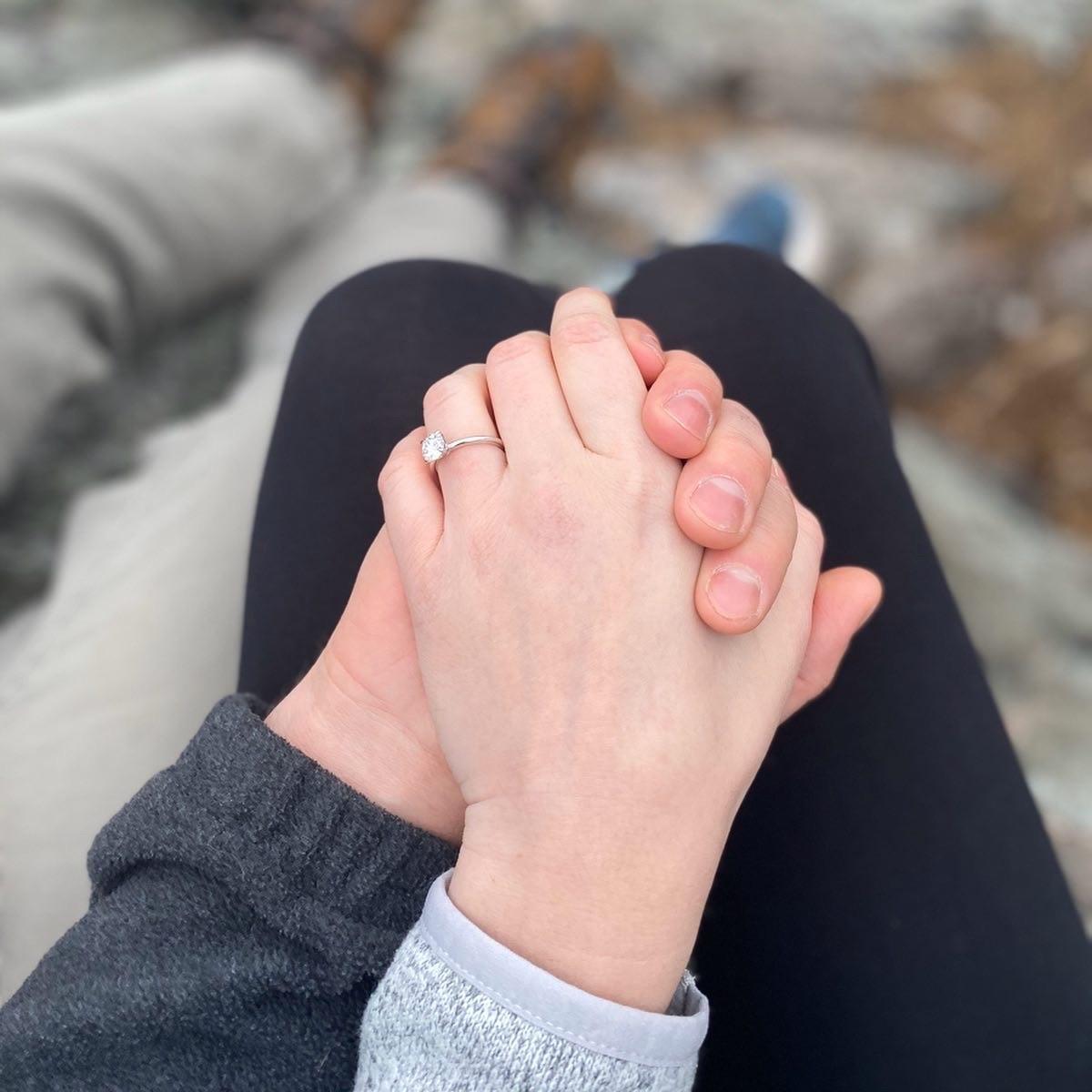 When Wes proposed, we were at the White Rocks overlook on Sugarloaf Mountain on a Friday morning, with no one else around. It was so beautiful and magical to have this place and moment to ourselves.
