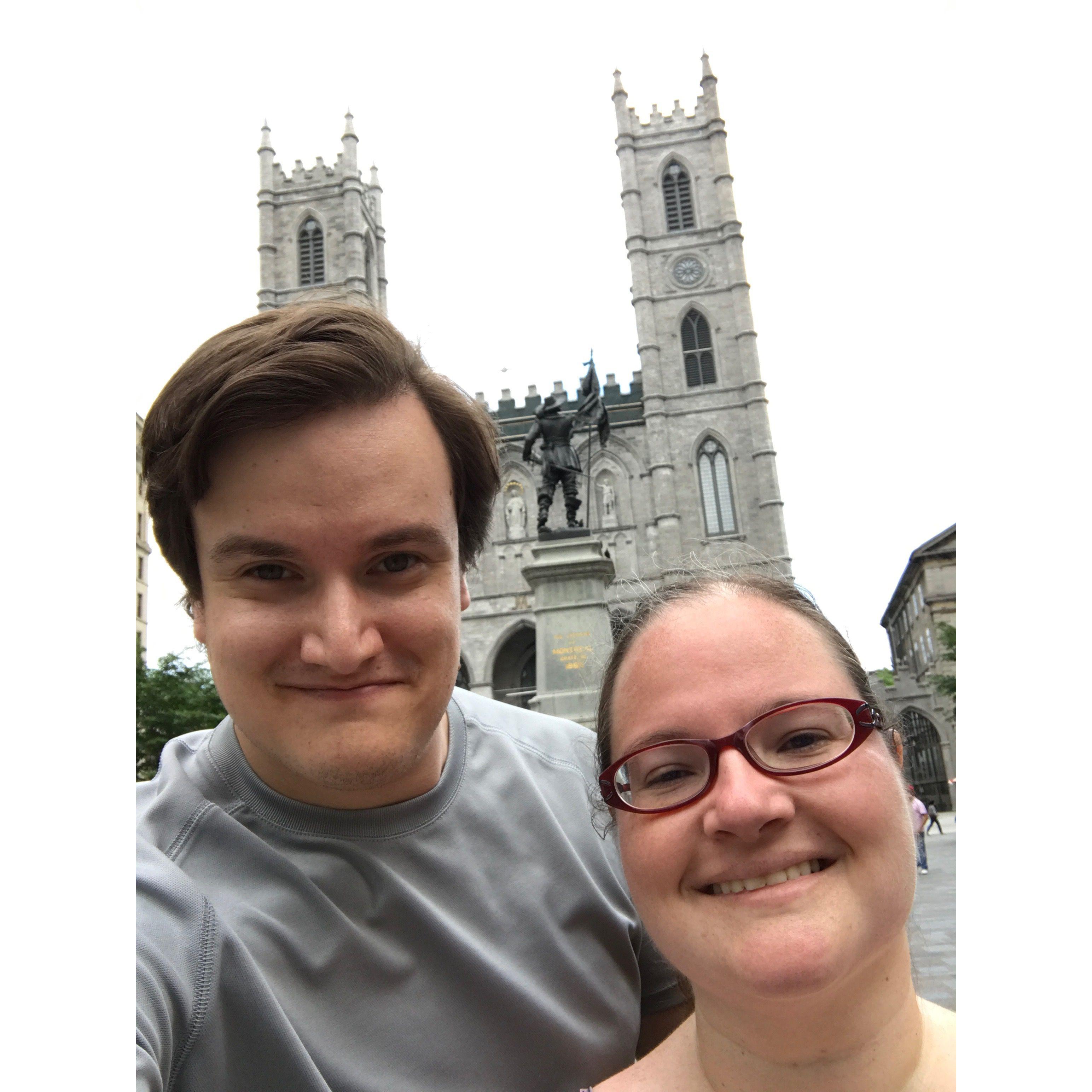 Selfie in front of a gothic church building, Montreal Notre-Dame Basilica.