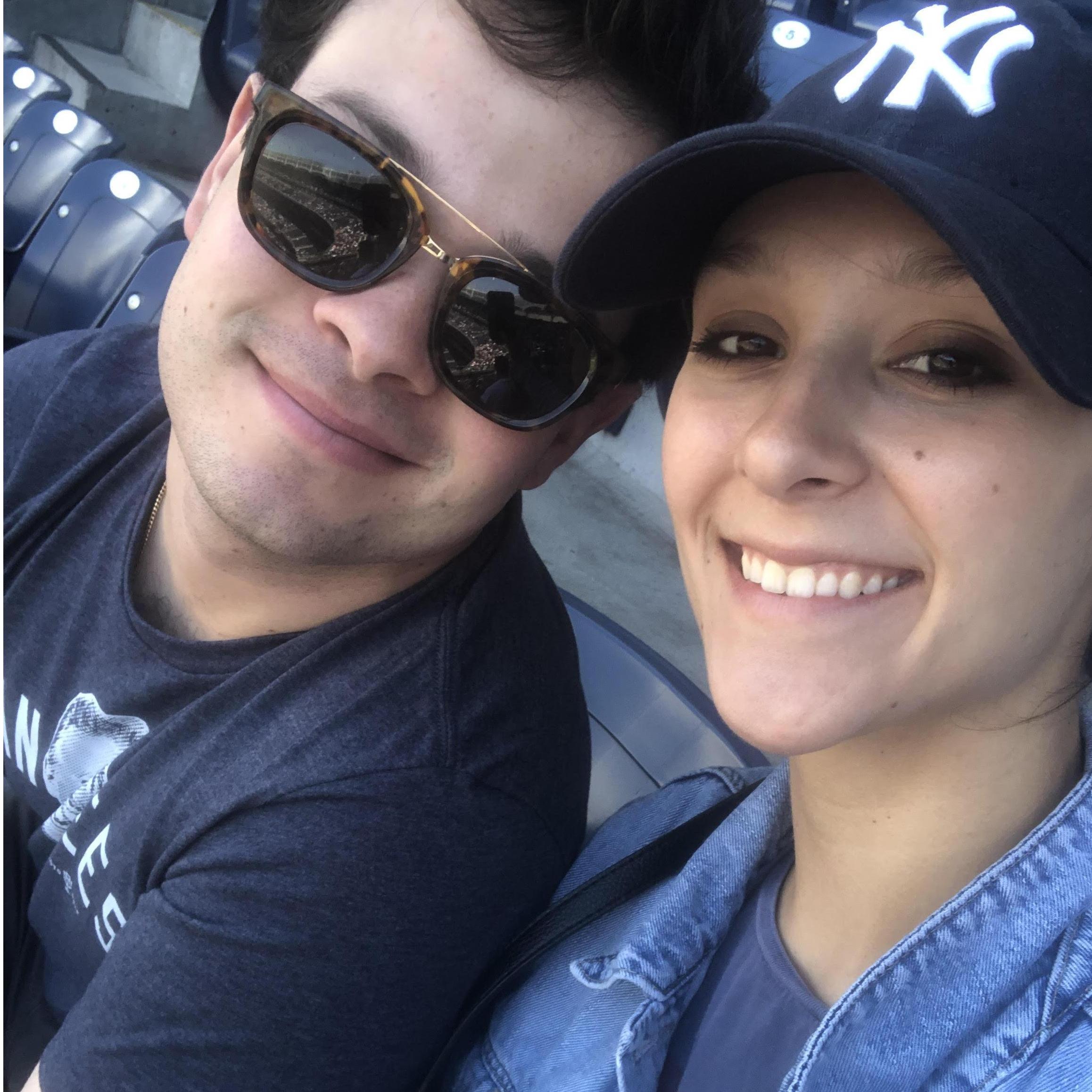 Antonio's passion for sports rubbing off on Ali at a Yankees game. She bought a hat and could identify at least two players by name. #Winning