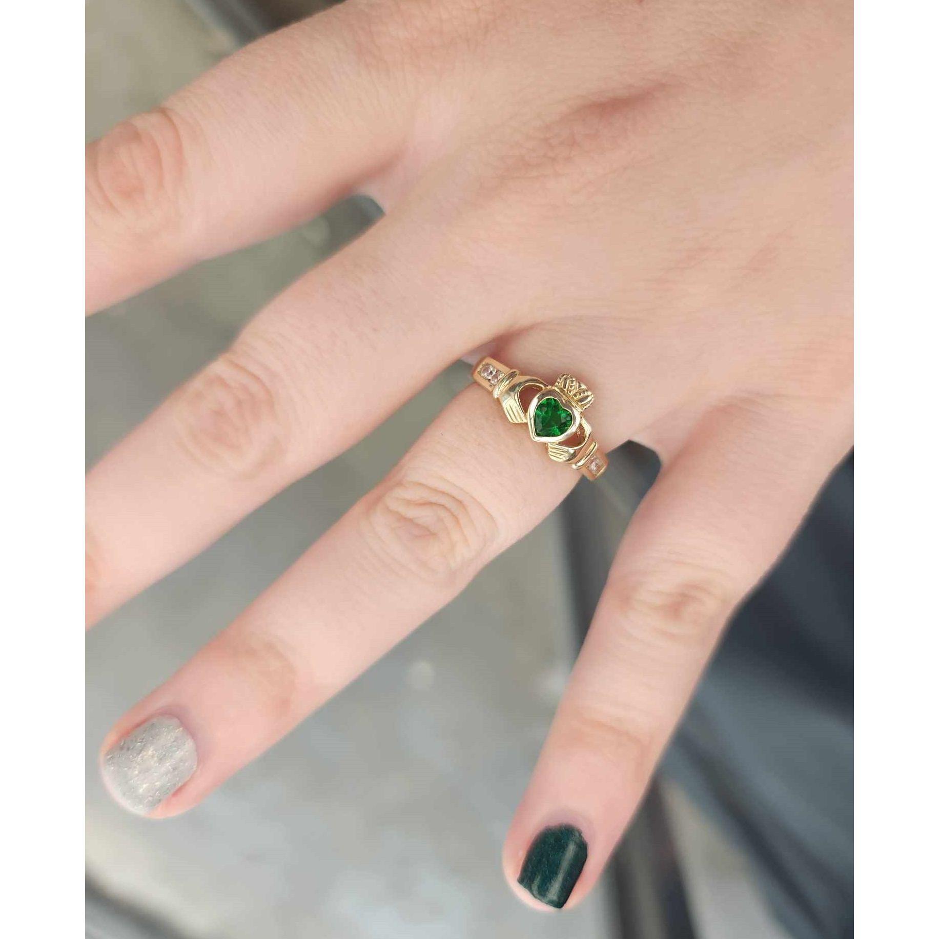 The actual engagement ring! (The other one was just a decoy) The Claddagh ring symbolizes love, friendship, and loyalty, represented by the heart, hands, and crown.