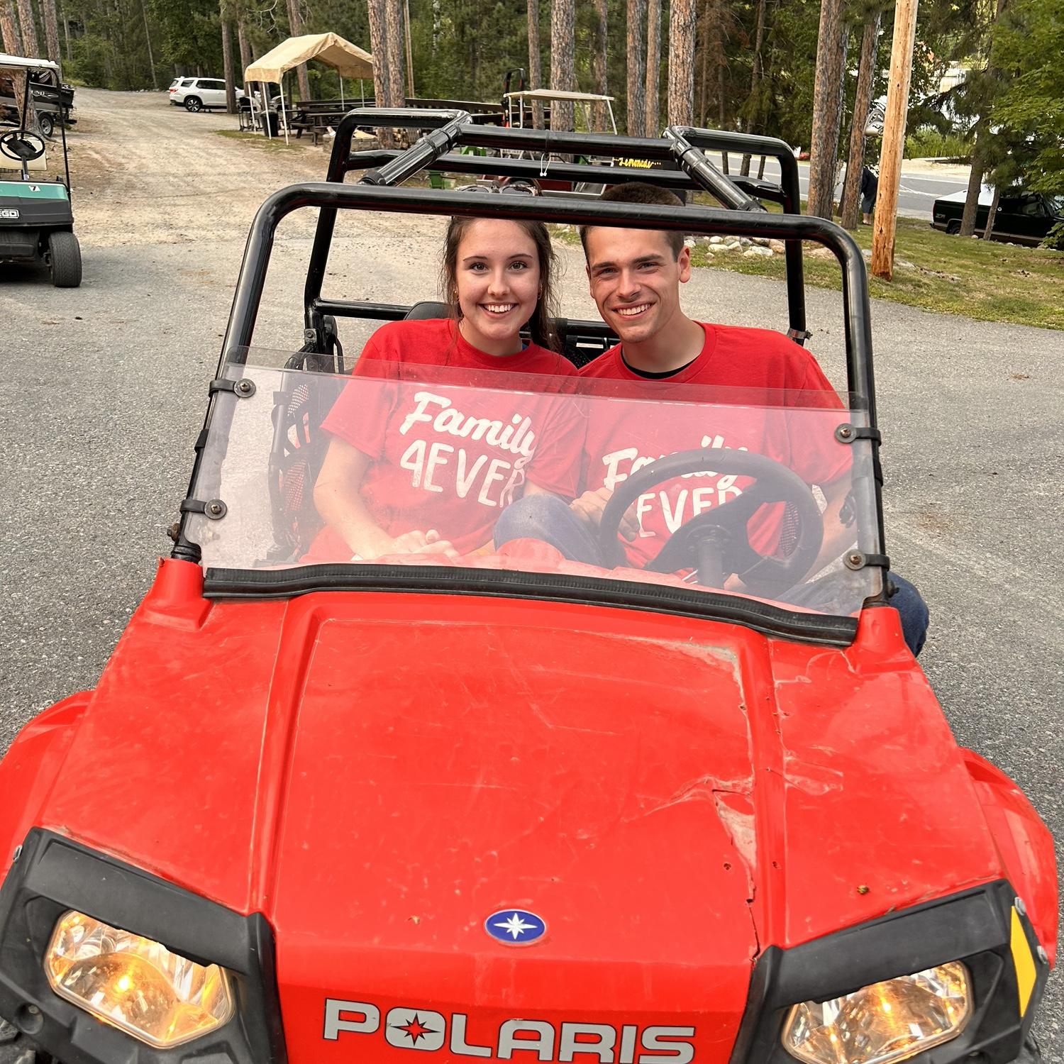 Going for a ride in the mini side by side Tristan had to fix on family vacation😂!