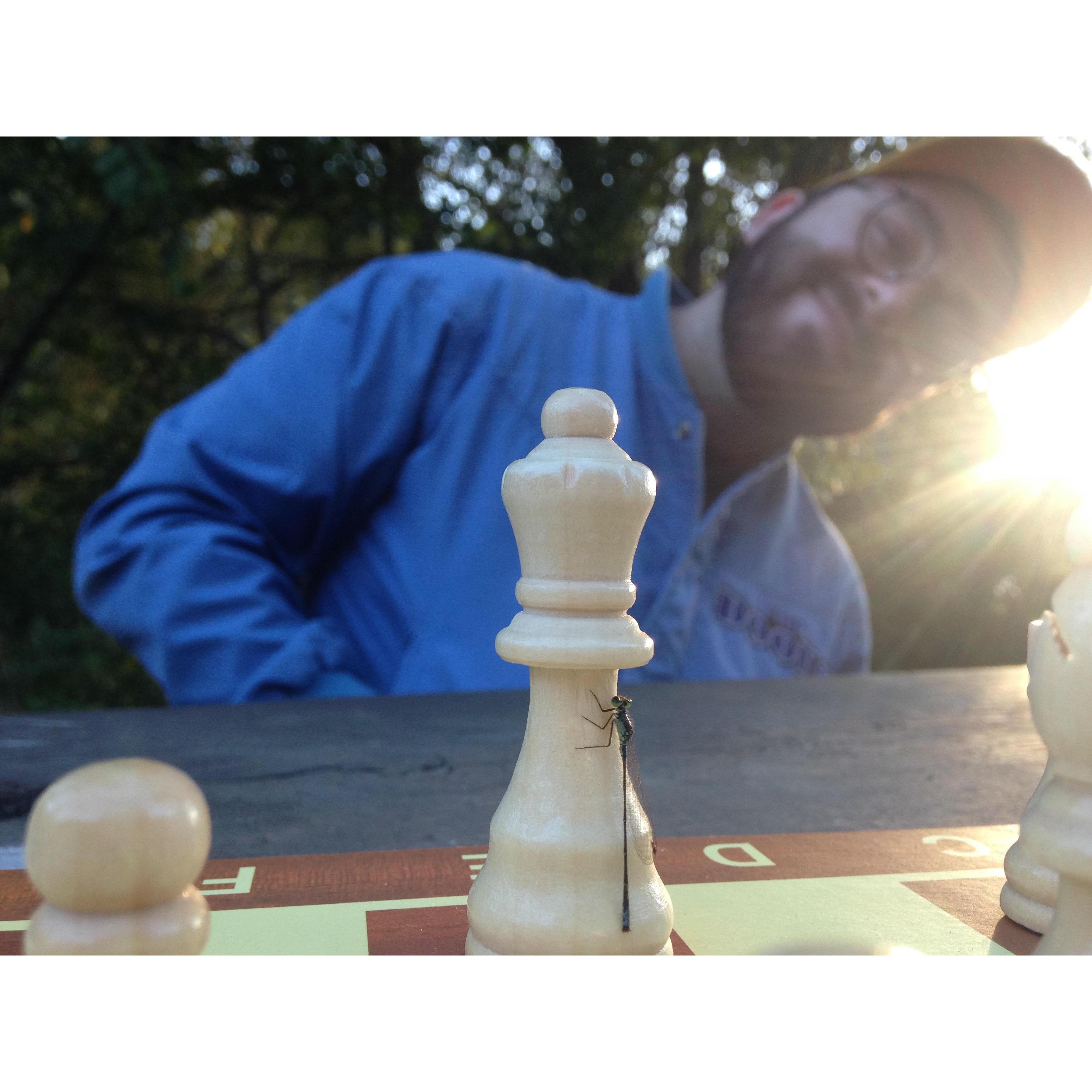 One of our first dates- playing chess at Lake Temescal.
