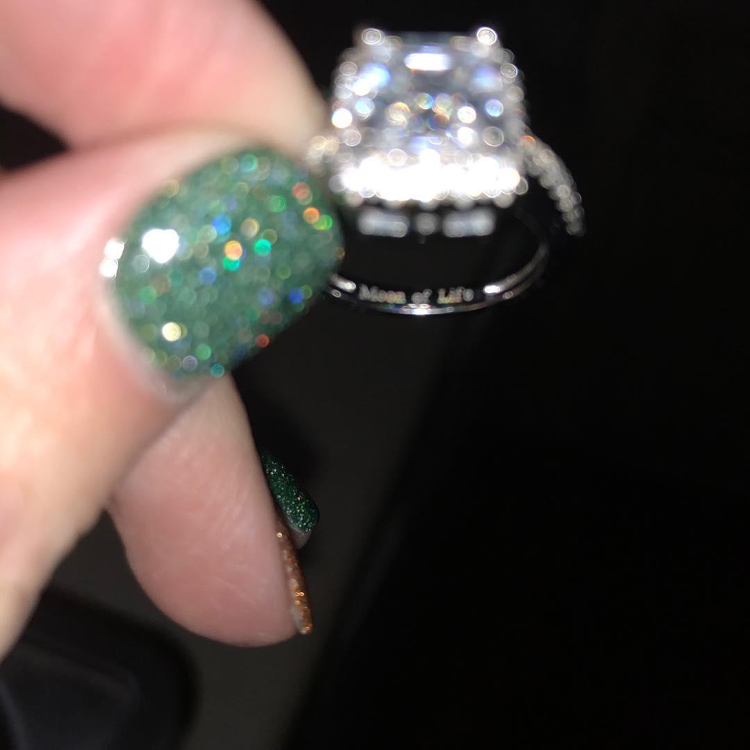 My Beautiful ring! Engraved with "moon of life" for the game of thrones fans that we are! My fingers were too small to fit moon of my life but I love it!!!!