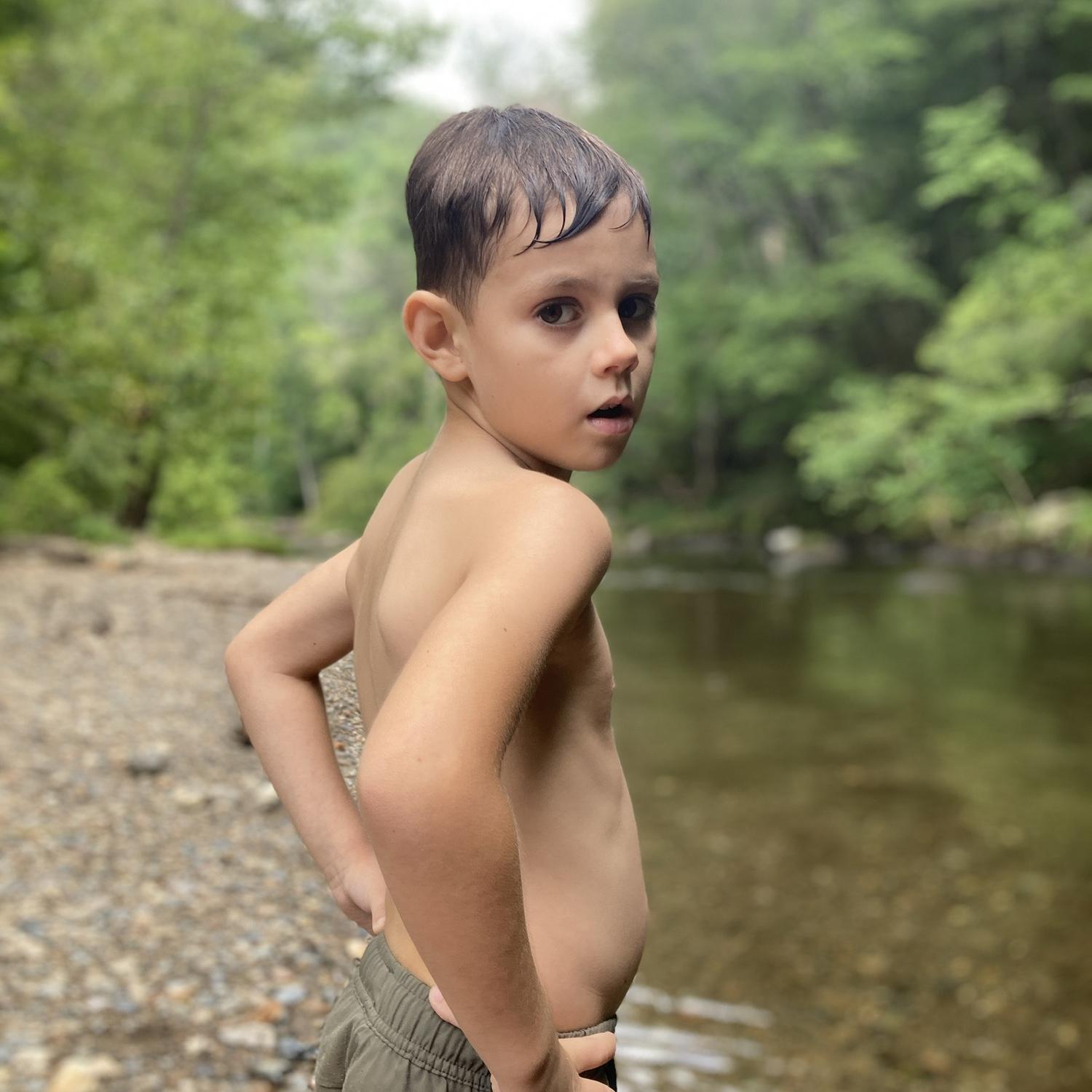 Playing in the river while camping