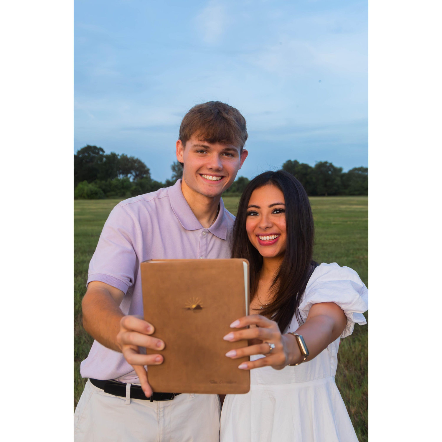 Holding our new family bible!