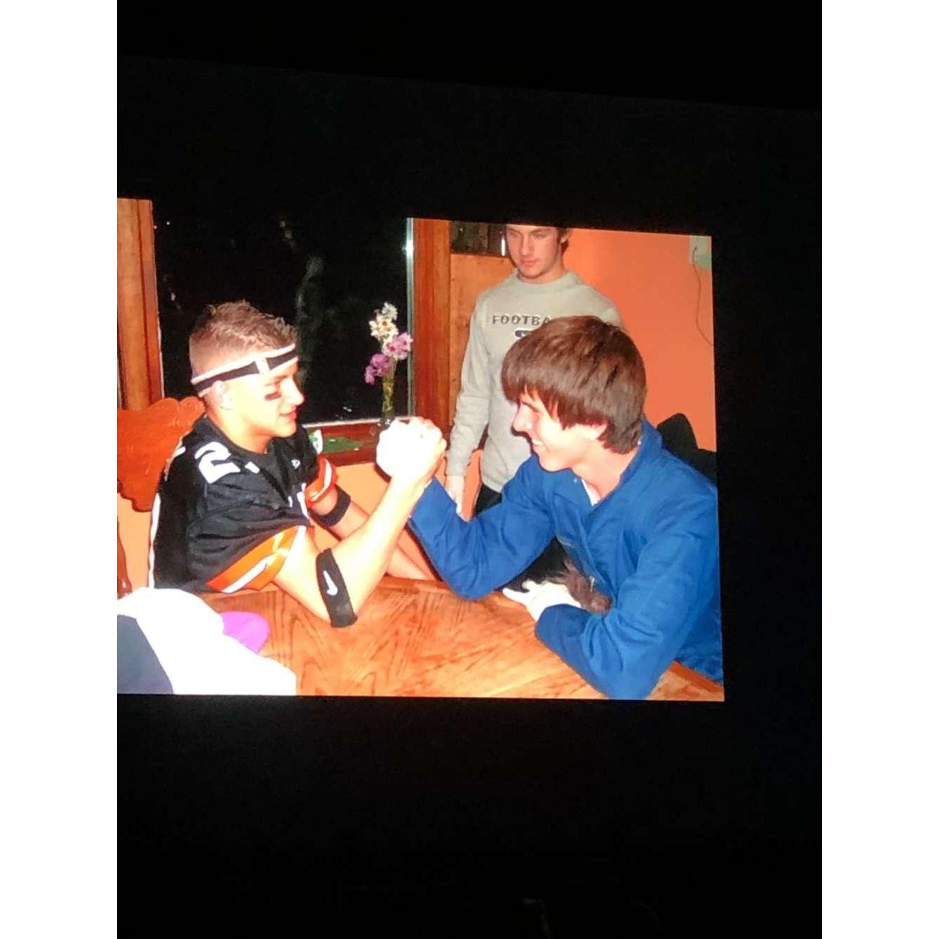 Jon and Brannon (Fry) arm wrestling, tennagers.