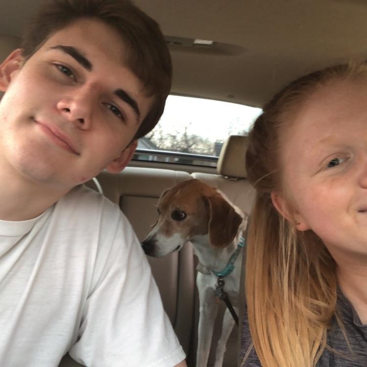 1 month into dating. Evan is slowly becoming a dog person...