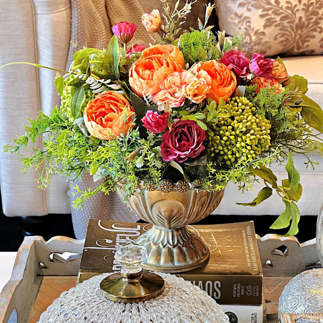 Floral centerpiece of plum-red roses & orange peonies in gold metal vase, Faux silk flower arrangement, artificial green fern, berries